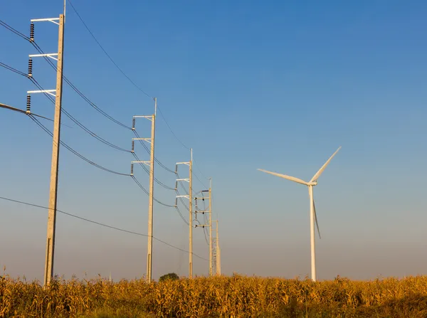 Wind turbine with transmission lines — Stock Photo, Image