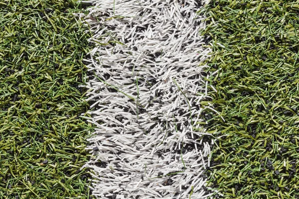 Campo de futebol de grama artificial ou campo de futsal interior — Fotografia de Stock