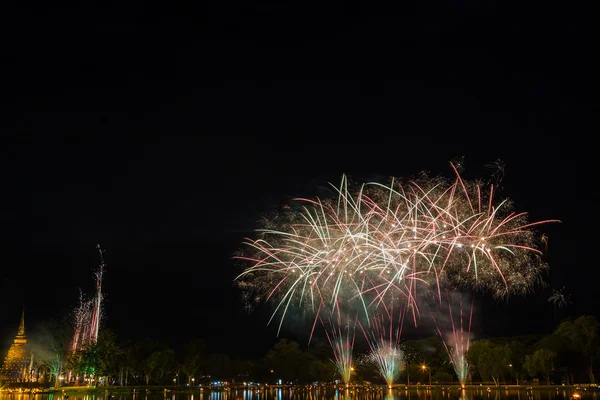 Firework with pagoda at Sukothai Thailand — Stock Photo, Image