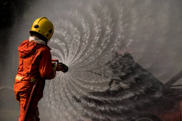 Firefighter Spray Water Fire Burning Car Fire Extinguished — Stock Photo, Image