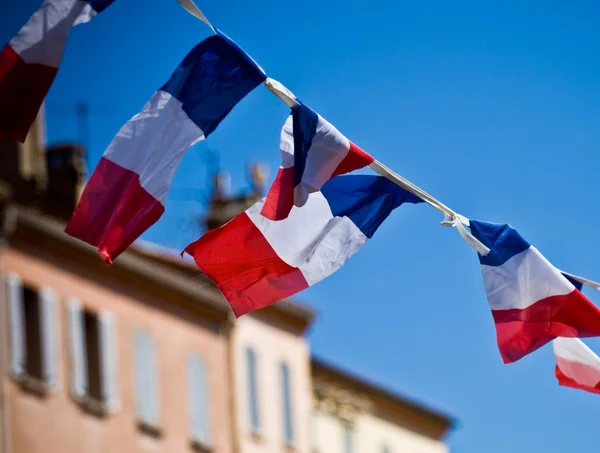 Frans vlaggen op een string Stockfoto