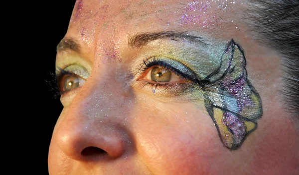 F kadın yüzü boyalı — Stok fotoğraf