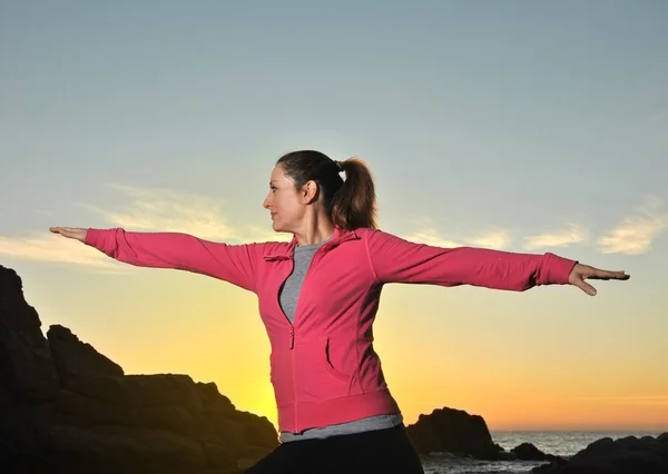 Woman doing yoga exercises — Stock Photo, Image