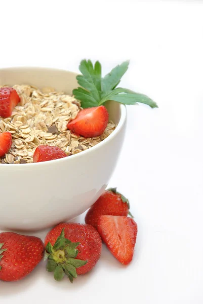 Bowl of cereal with milk and strawberries — Stock Photo, Image