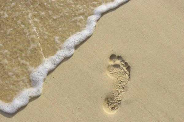 Voetstap op het zand — Stockfoto