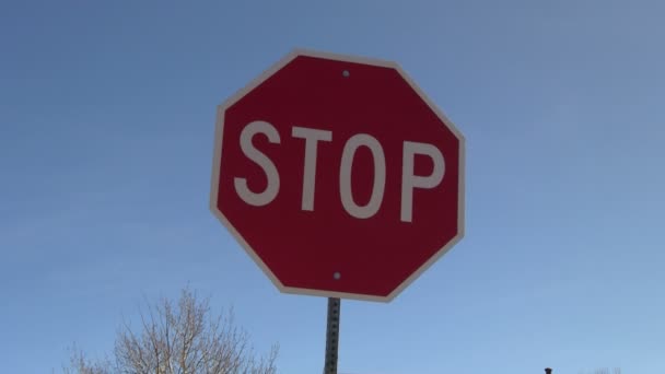 Stop sign with right to left trucking — Stock Video