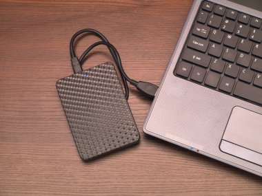 portable hard drive and laptop computer clipart