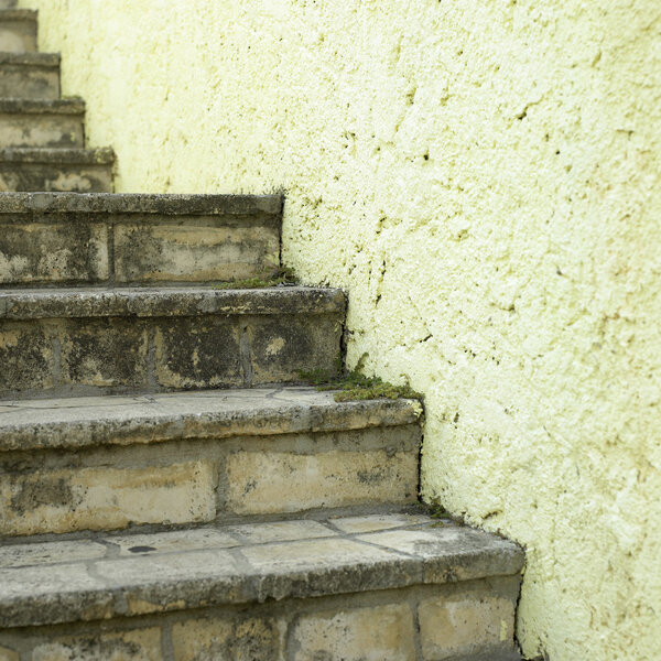 Stone stairs and yellow wall details