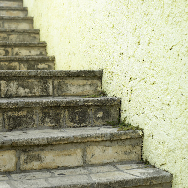 Stone stairs and yellow wall details