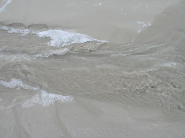 Water en zand — Stockfoto
