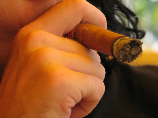 Man smoking a cigar — Stock Photo, Image