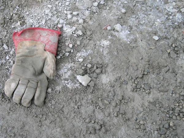 Glove on the ground — Stock Photo, Image