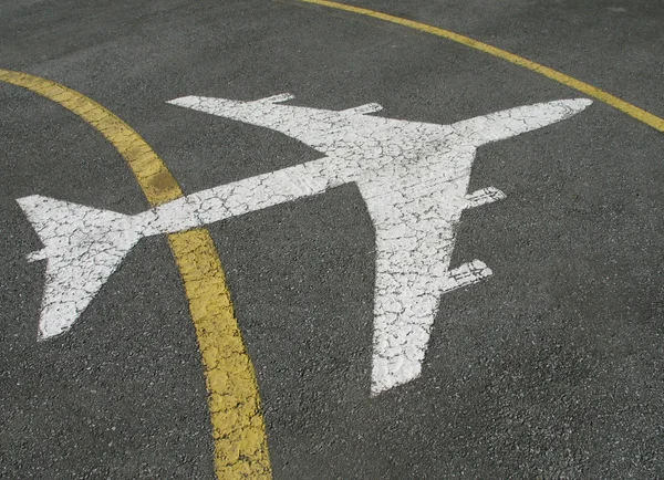 Avião pintado em pavimento — Fotografia de Stock