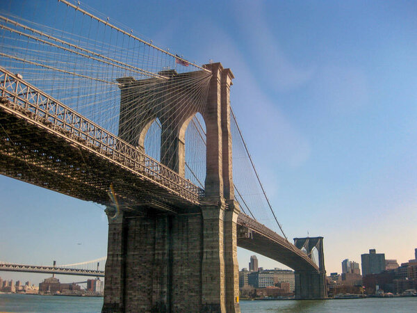 New York, USA - November 2009: Brooklyn Bridge, which crosses the East River to connect Manhattan to Brooklyn. It carries vehicles and pedestrians.