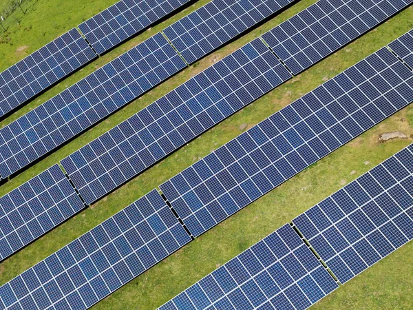Aerial View Rows Solar Panels Instaked Farm Field People — 图库照片