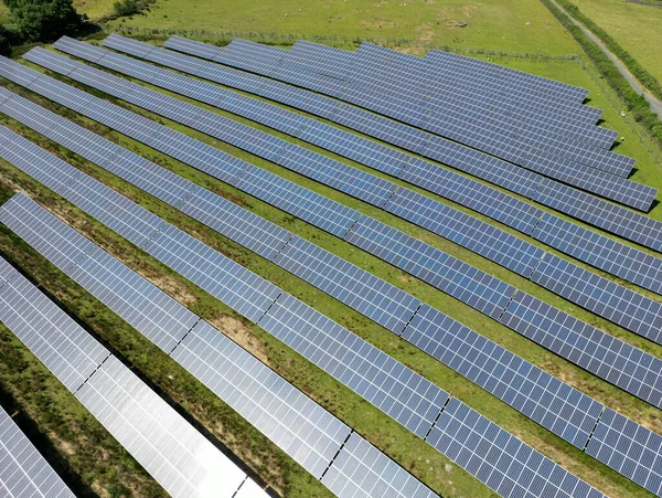 Aerial View Rows Solar Panels Instaked Farm Field People — 图库照片