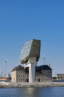 Antwerp, Belgium - August 2022: Exterior of the Antwerp Port Authority building in the city's commercial docks. The architect was Zaha Hadid.