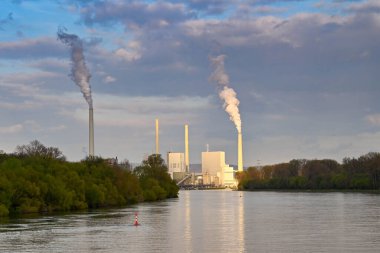 Mannheim, Germany - April 2022: Large power plant near Mannheim on the banks of the River Rhine. The plant is operated by CKM.