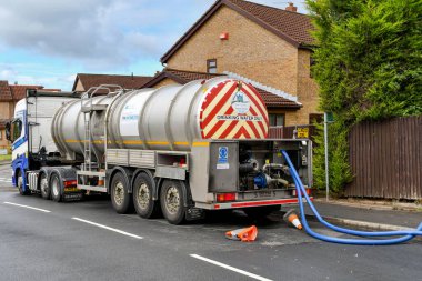 Pontypridd, Wales - August 2022: Rear view of a water tanker being used to provide water to residents without any water due to a burst main