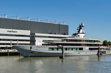 Alblasserdam, Netherlands - August 2022: Brand new luxury super yacht moored outside the Oceanco shipyard. It is reported to have been built for Amazon owner Jeff Bezos.