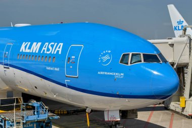 Amsterdam, Netherlands - August 2022: Close up view of the front of a KLM Boeing 777 jet parked at the airport terminal at Schipol airport