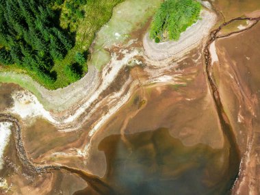 Aerial view of very low water level in a reservoir due to a summer drought