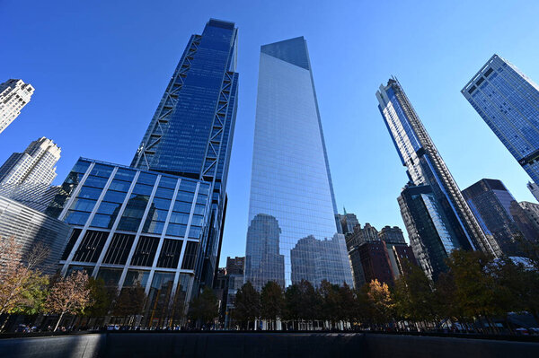 Reflecting pool and surrounding buildings at National September 11 Memorial.