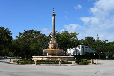 Coral Gables, Florida - May 14, 2022 - DeSoto Plaza and Fountain on sunny May morning. clipart