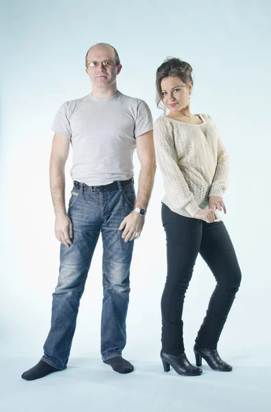 Portrait of man and girl standing in various poses — Stock Photo, Image