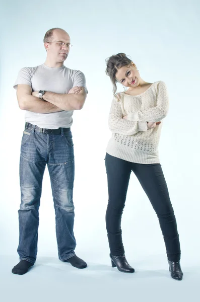 Portrait of man and girl standing in various poses — Stock Photo, Image