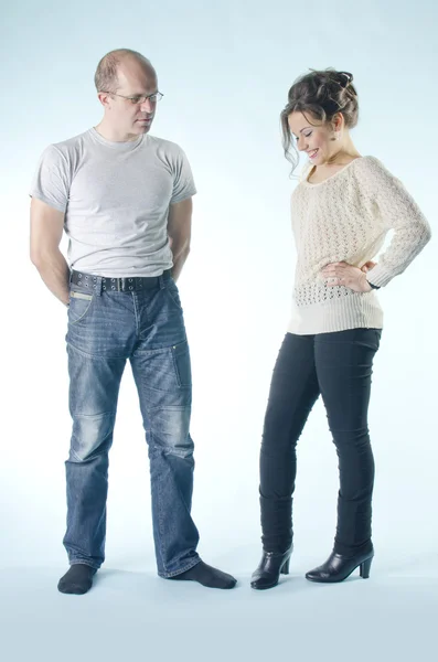 Portrait of man and girl standing in various poses — Stock Photo, Image