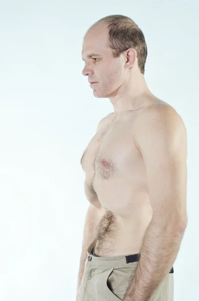 Portret silny człowiek robi asan jogi — Zdjęcie stockowe