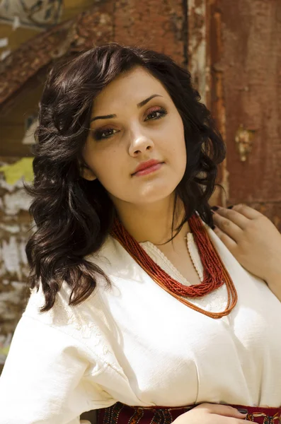 Portrait of beautiful young girl in traditional ukrainian cloth — Stock Photo, Image