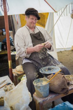 Ustası (potter) Ortaçağ piyasada