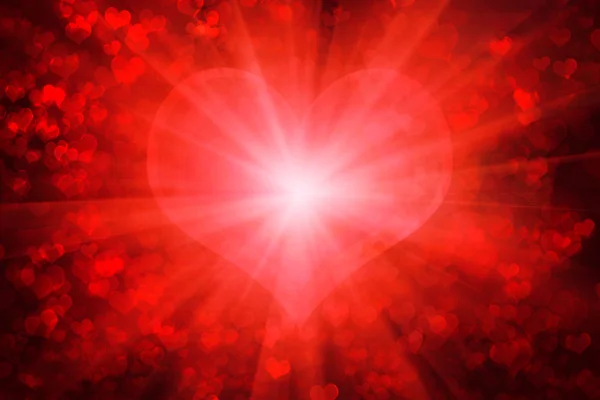 Red glowing Valentine 's day background — стоковое фото