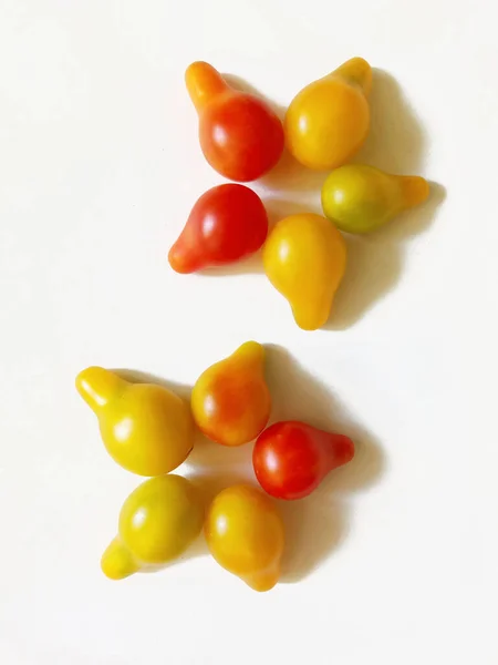 Floral Ornament Made Yellow Red Pear Shaped Cherry Tomatoes —  Fotos de Stock