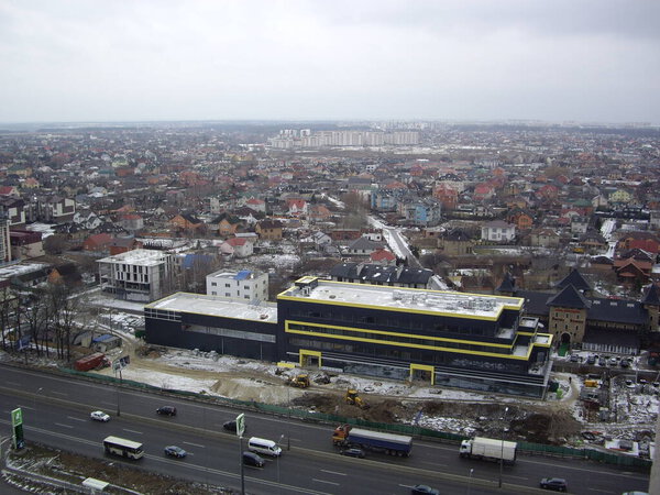 KIEV, UKRAINE - JANUARY 18, 2022: City from the height of the high-rise buildings