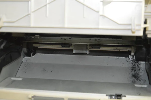 Charging the laser printer cartridge with toner the powder