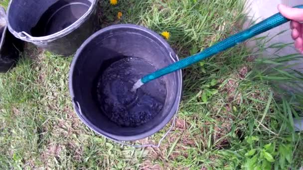 Water Pouring Well Plastic Buckets — Vídeo de stock