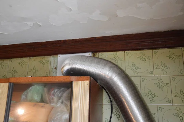 Installing Kitchen Hood Ventilation — стоковое фото