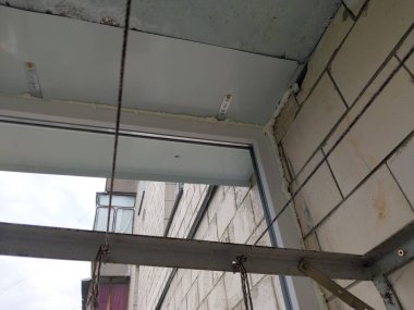 Installed metal-plastic windows on the balcony of a the residential building