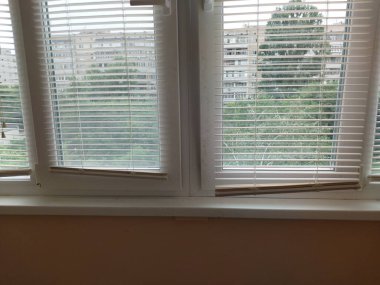 Installed metal-plastic windows on the balcony of a the residential building