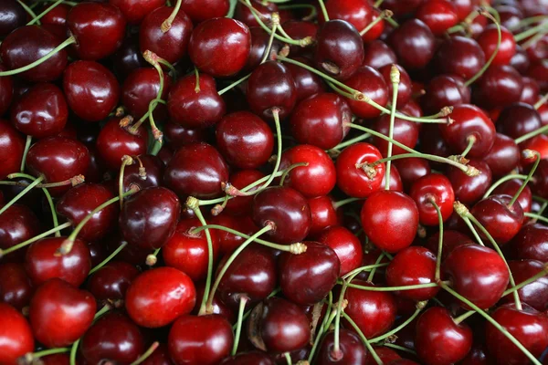 Fresh cherries natural cherry to background on the street market Stock Image