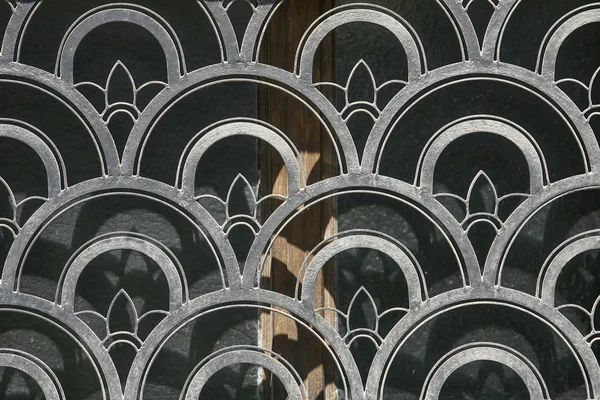 abstract decorative metal protection for windows