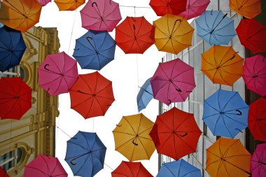 Umbrellas in different colors clipart