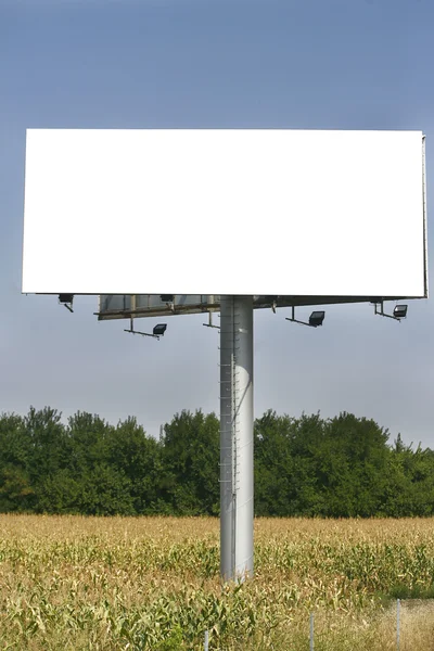 Empty billboard on background of sunset sky Royalty Free Stock Images