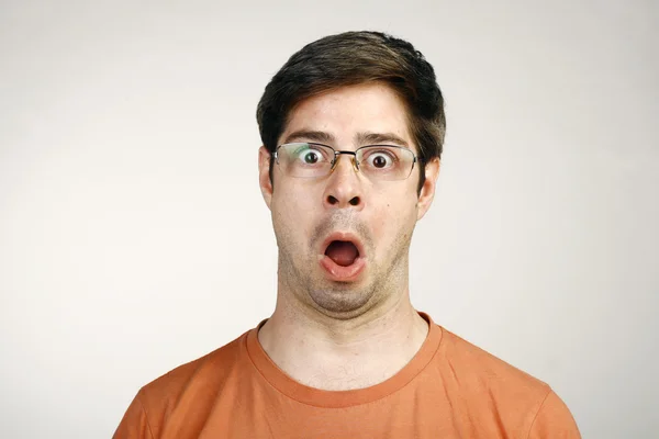 Retrato de un hombre sorprendido expresión de cara — Foto de Stock