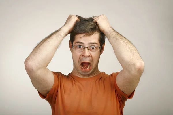 Portrait of a frustrated man with the glasses — Stock Photo, Image