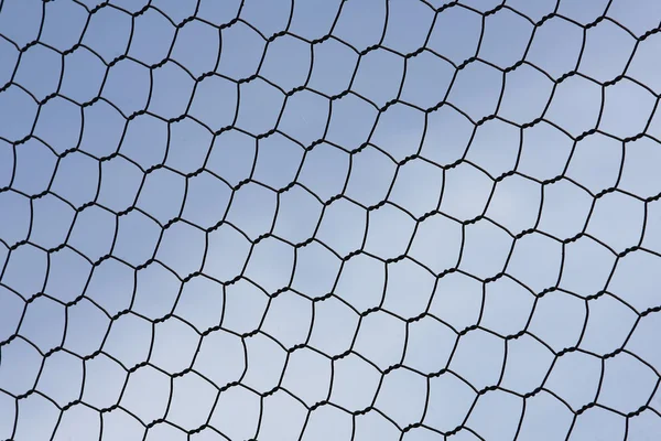 Metal wire fence protection isolated on sky for background — Stock Photo, Image