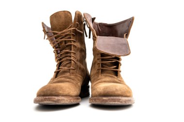 Old used leather Women's boots  isolated on white background.